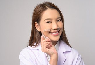 woman smiling about the cost of Invisalign® in Beverly Hills